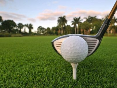 golf ball and club